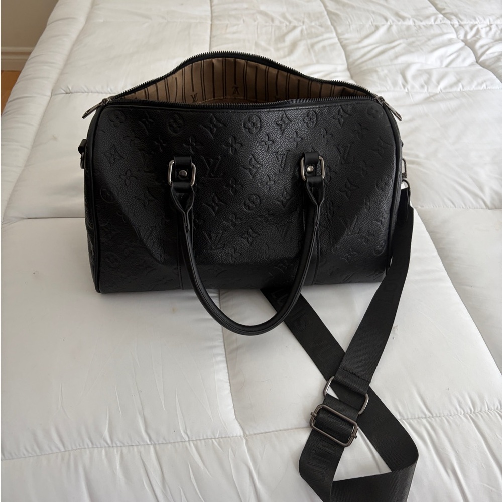 Black logo LV leather travel bag